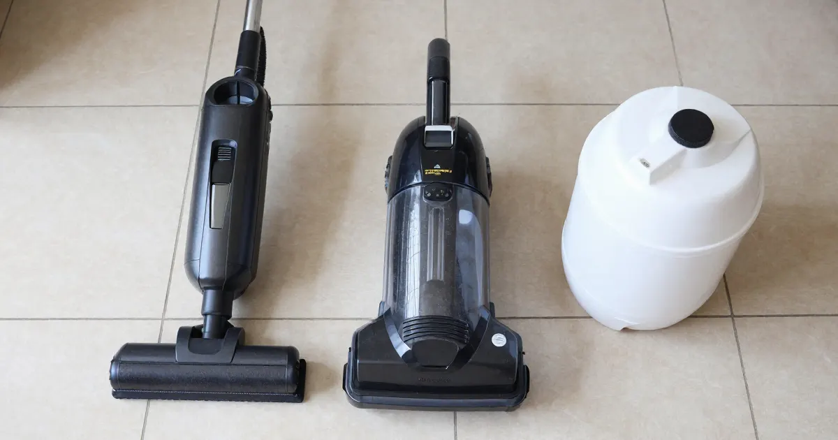 Illustration of two generic cordless floor washers on a tiled floor next to a white water container